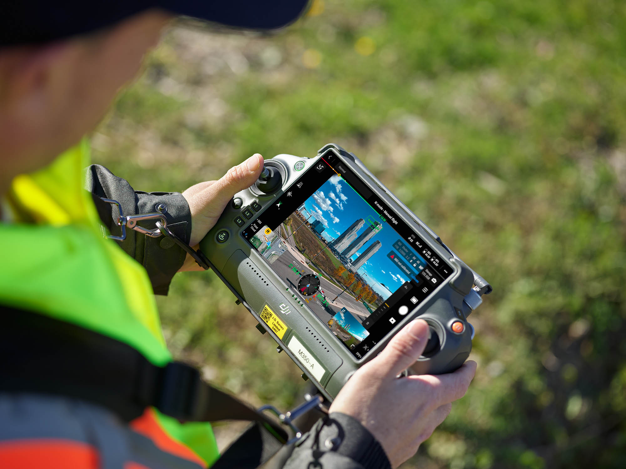 Pilot operating the controls that make the drone fly
